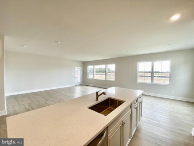 MOVE IN READY-UNFINISHED BASEMENT!  Photos are of actual home! on Plantation Lakes Golf and Country Club in Delaware - for sale on GolfHomes.com, golf home, golf lot