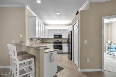 Welcome to this charming villa, formerly a model home, that is on Pelican Preserve Golf Club in Florida - for sale on GolfHomes.com, golf home, golf lot