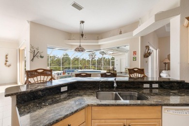 This TURN-KEY FURNISHED, custom-built pool home by Newport Homes on Rotonda Golf and Country Club The Links Course in Florida - for sale on GolfHomes.com, golf home, golf lot