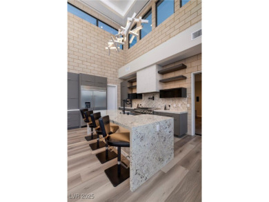 This stunning single-story smart home blends luxury with on Reflection Bay Golf Club in Nevada - for sale on GolfHomes.com, golf home, golf lot