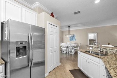 Welcome to this charming villa, formerly a model home, that is on Pelican Preserve Golf Club in Florida - for sale on GolfHomes.com, golf home, golf lot