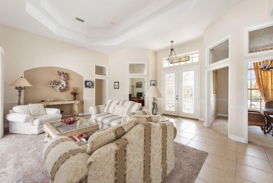 This TURN-KEY FURNISHED, custom-built pool home by Newport Homes on Rotonda Golf and Country Club The Links Course in Florida - for sale on GolfHomes.com, golf home, golf lot