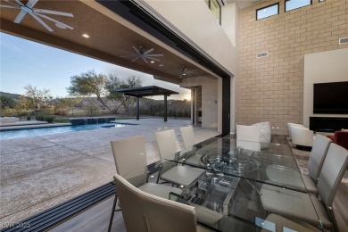 This stunning single-story smart home blends luxury with on Reflection Bay Golf Club in Nevada - for sale on GolfHomes.com, golf home, golf lot