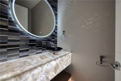 This stunning single-story smart home blends luxury with on Reflection Bay Golf Club in Nevada - for sale on GolfHomes.com, golf home, golf lot