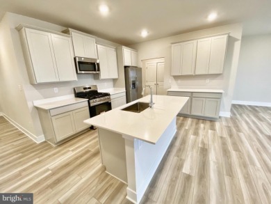 MOVE IN READY-9 ft ceilings!  The Exeter exhibits one level on Plantation Lakes Golf and Country Club in Delaware - for sale on GolfHomes.com, golf home, golf lot