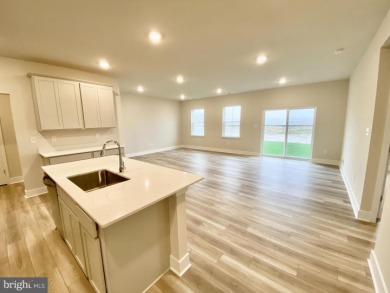 MOVE IN READY-9 ft ceilings!  The Exeter exhibits one level on Plantation Lakes Golf and Country Club in Delaware - for sale on GolfHomes.com, golf home, golf lot