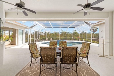 This TURN-KEY FURNISHED, custom-built pool home by Newport Homes on Rotonda Golf and Country Club The Links Course in Florida - for sale on GolfHomes.com, golf home, golf lot