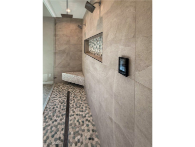 This stunning single-story smart home blends luxury with on Reflection Bay Golf Club in Nevada - for sale on GolfHomes.com, golf home, golf lot