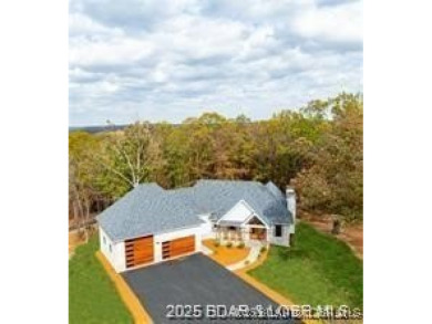 Step into the epitome of luxurious living at The Estates of on The Club At Old Kinderhook in Missouri - for sale on GolfHomes.com, golf home, golf lot