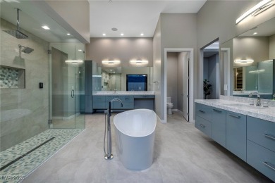 This stunning single-story smart home blends luxury with on Reflection Bay Golf Club in Nevada - for sale on GolfHomes.com, golf home, golf lot