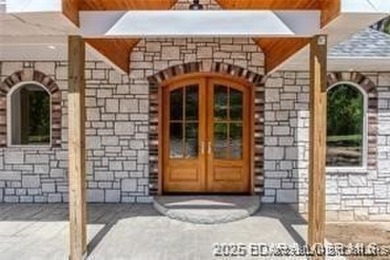 Step into the epitome of luxurious living at The Estates of on The Club At Old Kinderhook in Missouri - for sale on GolfHomes.com, golf home, golf lot