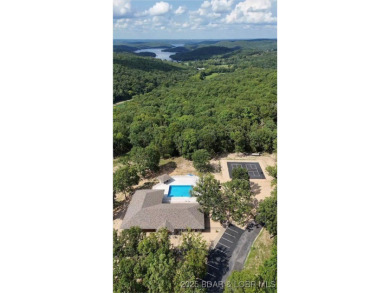 Step into the epitome of luxurious living at The Estates of on The Club At Old Kinderhook in Missouri - for sale on GolfHomes.com, golf home, golf lot