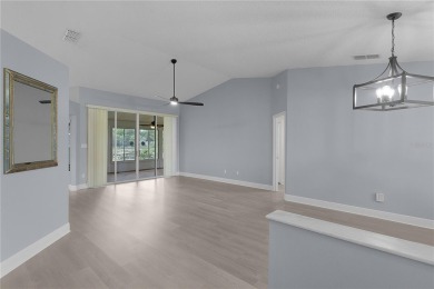 A must see, this beautifully maintained 3-bedroom, 2-bath on Plantation Golf Club in Florida - for sale on GolfHomes.com, golf home, golf lot
