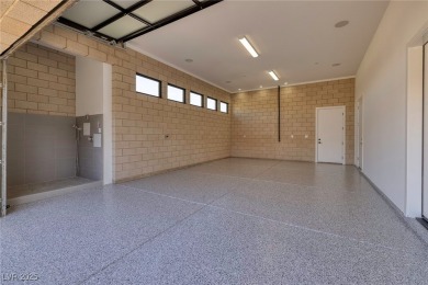 This stunning single-story smart home blends luxury with on Reflection Bay Golf Club in Nevada - for sale on GolfHomes.com, golf home, golf lot