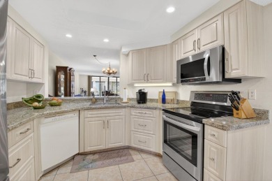beautiful 2 bedroom 2 bath condo with tranquil lake and golf on Gleneagles Golf and Country Club in Florida - for sale on GolfHomes.com, golf home, golf lot