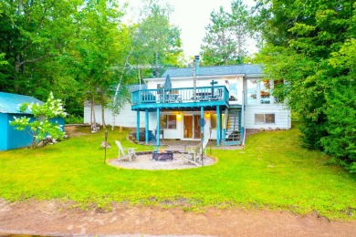 SANDY WATERFRONT Move-in ready Rare one-of-a-kind opportunity on on Antigo Bass Lake Country Club in Wisconsin - for sale on GolfHomes.com, golf home, golf lot