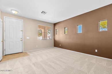 This spacious 2,013 sf home has 3 BR, 2 BA, kitchen, living rm on Estrella Mountain Ranch Golf Course in Arizona - for sale on GolfHomes.com, golf home, golf lot