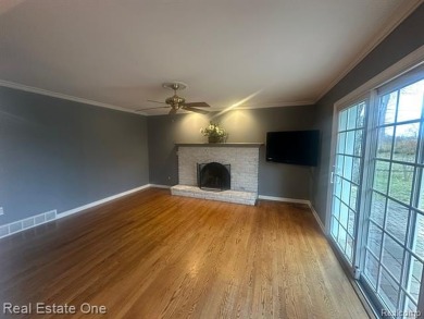 BEAUTIFULLY UPDATED SPACIOUS 4 BEDROOM, 2.5 BATH HOME ON AN on Silver Lake Golf Club in Michigan - for sale on GolfHomes.com, golf home, golf lot