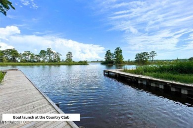Love to golf? This beautiful 4-bedroom 2-bath brick home nestled on Mississippi National Golf Course in Mississippi - for sale on GolfHomes.com, golf home, golf lot
