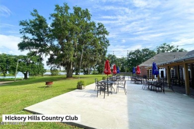 Love to golf? This beautiful 4-bedroom 2-bath brick home nestled on Mississippi National Golf Course in Mississippi - for sale on GolfHomes.com, golf home, golf lot