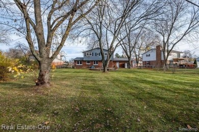 BEAUTIFULLY UPDATED SPACIOUS 4 BEDROOM, 2.5 BATH HOME ON AN on Silver Lake Golf Club in Michigan - for sale on GolfHomes.com, golf home, golf lot