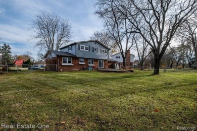 BEAUTIFULLY UPDATED SPACIOUS 4 BEDROOM, 2.5 BATH HOME ON AN on Silver Lake Golf Club in Michigan - for sale on GolfHomes.com, golf home, golf lot