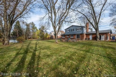 BEAUTIFULLY UPDATED SPACIOUS 4 BEDROOM, 2.5 BATH HOME ON AN on Silver Lake Golf Club in Michigan - for sale on GolfHomes.com, golf home, golf lot