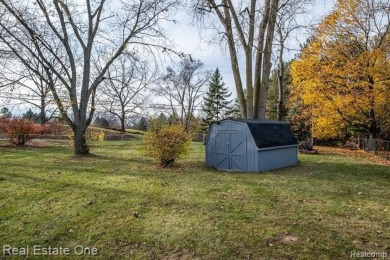 BEAUTIFULLY UPDATED SPACIOUS 4 BEDROOM, 2.5 BATH HOME ON AN on Silver Lake Golf Club in Michigan - for sale on GolfHomes.com, golf home, golf lot