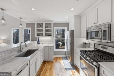 Welcome to the lake life! Nestled within the sought after on The Highlands Course at Lake Arrowhead in Georgia - for sale on GolfHomes.com, golf home, golf lot