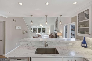 Welcome to the lake life! Nestled within the sought after on The Highlands Course at Lake Arrowhead in Georgia - for sale on GolfHomes.com, golf home, golf lot