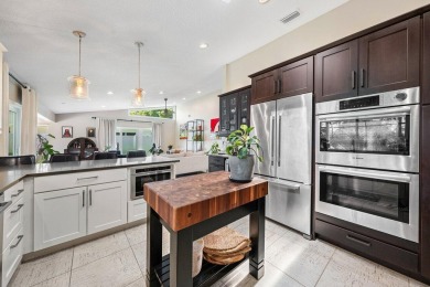 Discover this stunning, impeccably renovated pool home offering on Lakeview Golf Club in Florida - for sale on GolfHomes.com, golf home, golf lot
