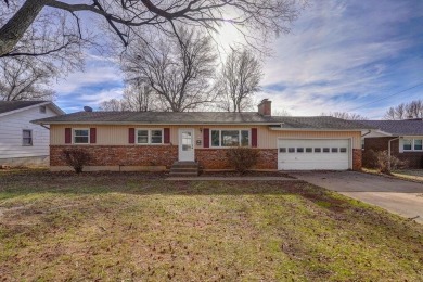Beautifully renovated and perfectly located near Horton Smith on Horton Smith Golf Course in Missouri - for sale on GolfHomes.com, golf home, golf lot