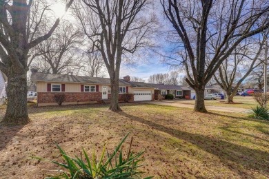 Beautifully renovated and perfectly located near Horton Smith on Horton Smith Golf Course in Missouri - for sale on GolfHomes.com, golf home, golf lot