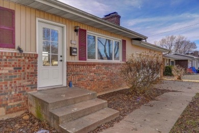 Beautifully renovated and perfectly located near Horton Smith on Horton Smith Golf Course in Missouri - for sale on GolfHomes.com, golf home, golf lot