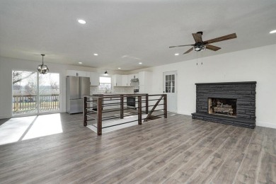 Beautifully renovated and perfectly located near Horton Smith on Horton Smith Golf Course in Missouri - for sale on GolfHomes.com, golf home, golf lot