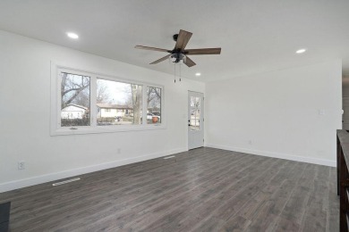 Beautifully renovated and perfectly located near Horton Smith on Horton Smith Golf Course in Missouri - for sale on GolfHomes.com, golf home, golf lot