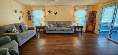 Furnished, spacious 2 bedroom 2 bath home in 55 + Resort style on Zephyrhills Municipal Golf Course in Florida - for sale on GolfHomes.com, golf home, golf lot