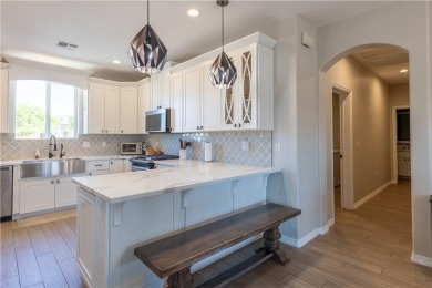 Welcome to your dream home! Nestled in a tranquil golf course on Los Lagos Golf Club in Arizona - for sale on GolfHomes.com, golf home, golf lot