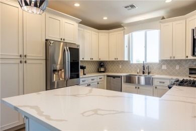 Welcome to your dream home! Nestled in a tranquil golf course on Los Lagos Golf Club in Arizona - for sale on GolfHomes.com, golf home, golf lot