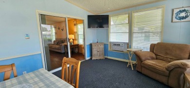Furnished, spacious 2 bedroom 2 bath home in 55 + Resort style on Zephyrhills Municipal Golf Course in Florida - for sale on GolfHomes.com, golf home, golf lot