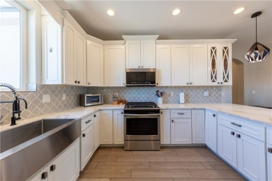 Welcome to your dream home! Nestled in a tranquil golf course on Los Lagos Golf Club in Arizona - for sale on GolfHomes.com, golf home, golf lot