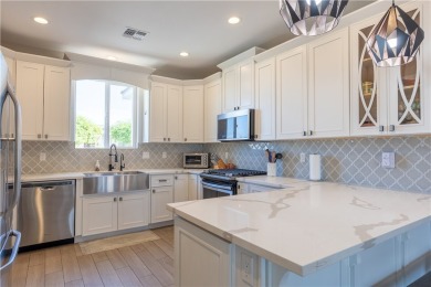 Welcome to your dream home! Nestled in a tranquil golf course on Los Lagos Golf Club in Arizona - for sale on GolfHomes.com, golf home, golf lot