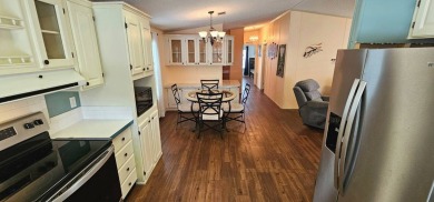 Furnished, spacious 2 bedroom 2 bath home in 55 + Resort style on Zephyrhills Municipal Golf Course in Florida - for sale on GolfHomes.com, golf home, golf lot