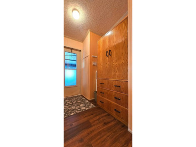 Furnished, spacious 2 bedroom 2 bath home in 55 + Resort style on Zephyrhills Municipal Golf Course in Florida - for sale on GolfHomes.com, golf home, golf lot