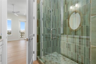 This newly completed waterfront home located in the prestigious on Lamar Golf Course in Texas - for sale on GolfHomes.com, golf home, golf lot