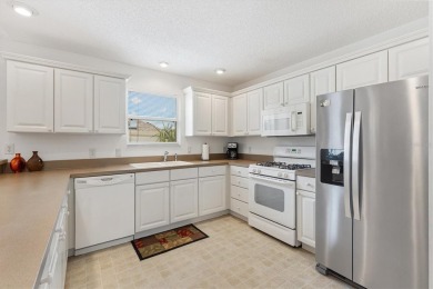 Bond Paid - This conviently located turn-key courtyard villa at on The Links of Spruce Creek in Florida - for sale on GolfHomes.com, golf home, golf lot
