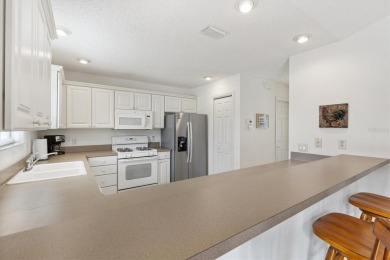 Bond Paid - This conviently located turn-key courtyard villa at on The Links of Spruce Creek in Florida - for sale on GolfHomes.com, golf home, golf lot