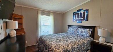 Furnished, spacious 2 bedroom 2 bath home in 55 + Resort style on Zephyrhills Municipal Golf Course in Florida - for sale on GolfHomes.com, golf home, golf lot