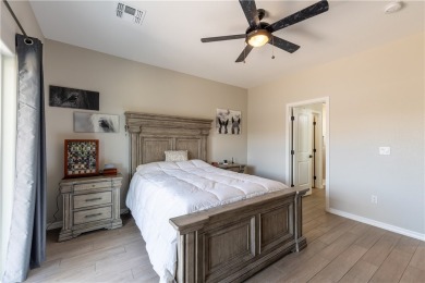 Welcome to your dream home! Nestled in a tranquil golf course on Los Lagos Golf Club in Arizona - for sale on GolfHomes.com, golf home, golf lot
