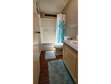 Furnished, spacious 2 bedroom 2 bath home in 55 + Resort style on Zephyrhills Municipal Golf Course in Florida - for sale on GolfHomes.com, golf home, golf lot
